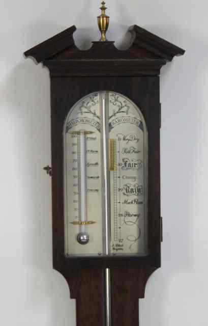 Appraisal: A reproduction stick barometer by J Blatt Brighton