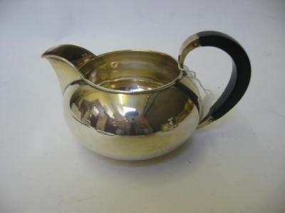 Appraisal: A MILK JUG stamped A F Rasmussen Sterling TS early