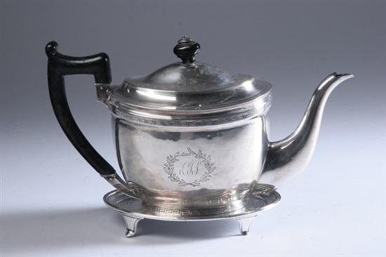 Appraisal: GEORGE III SILVER TEAPOT AND FOOTED STAND John Emes London