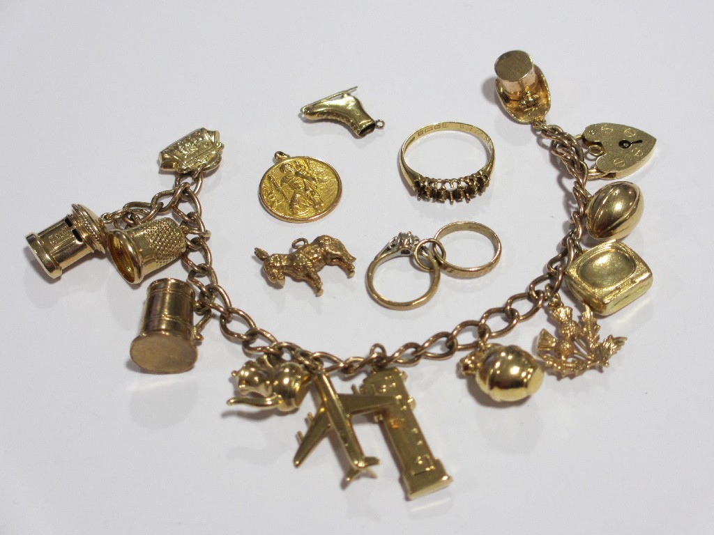 Appraisal: Lot comprising a ct gold charm bracelet with charms gms