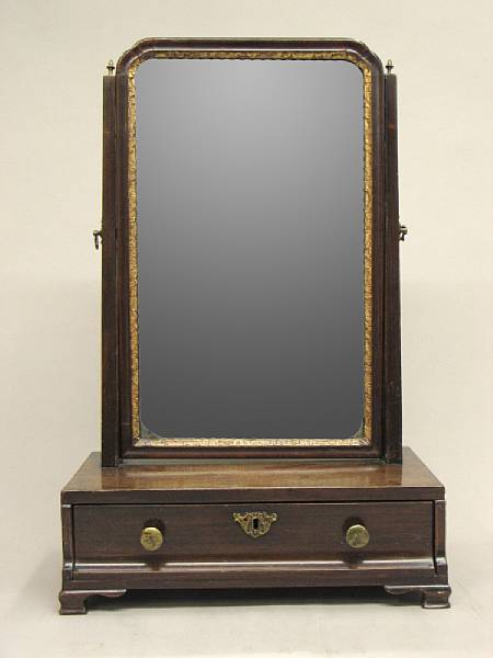 Appraisal: A George II mahogany parcel gilt dressing mirror mid th