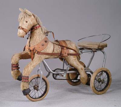 Appraisal: OLD HIDE-COVERED PONY TRICYCLE I m sure the little fellow