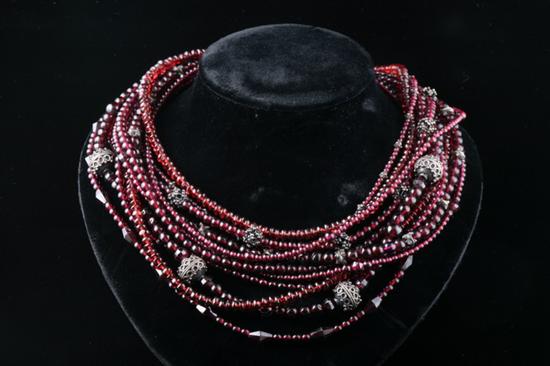 Appraisal: STEPHEN DWECK GARNET AND STERLING SILVER NECKLACE Multi-strand garnet bead