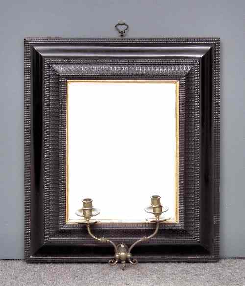 Appraisal: An ebonised and moulded rectangular picture frame later converted to