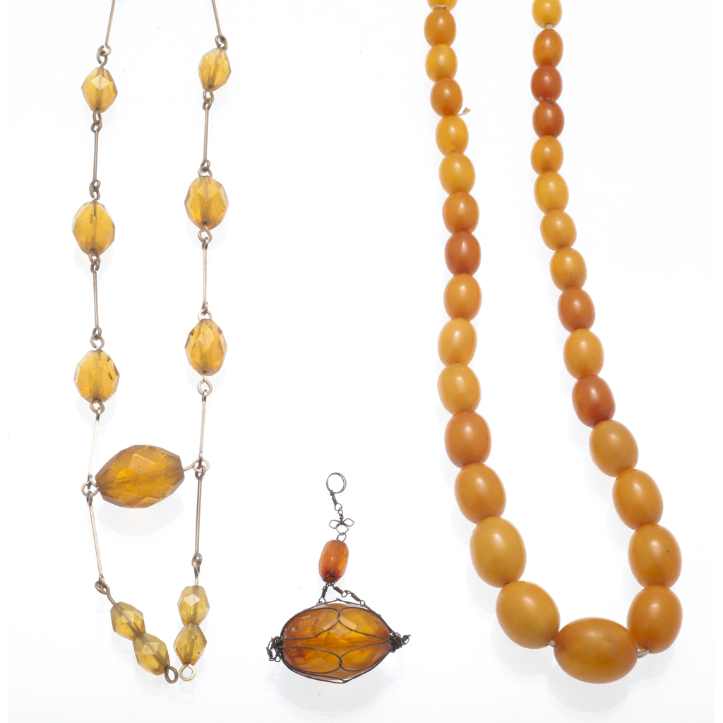 Appraisal: A collection of amber jewellery to include a single strand