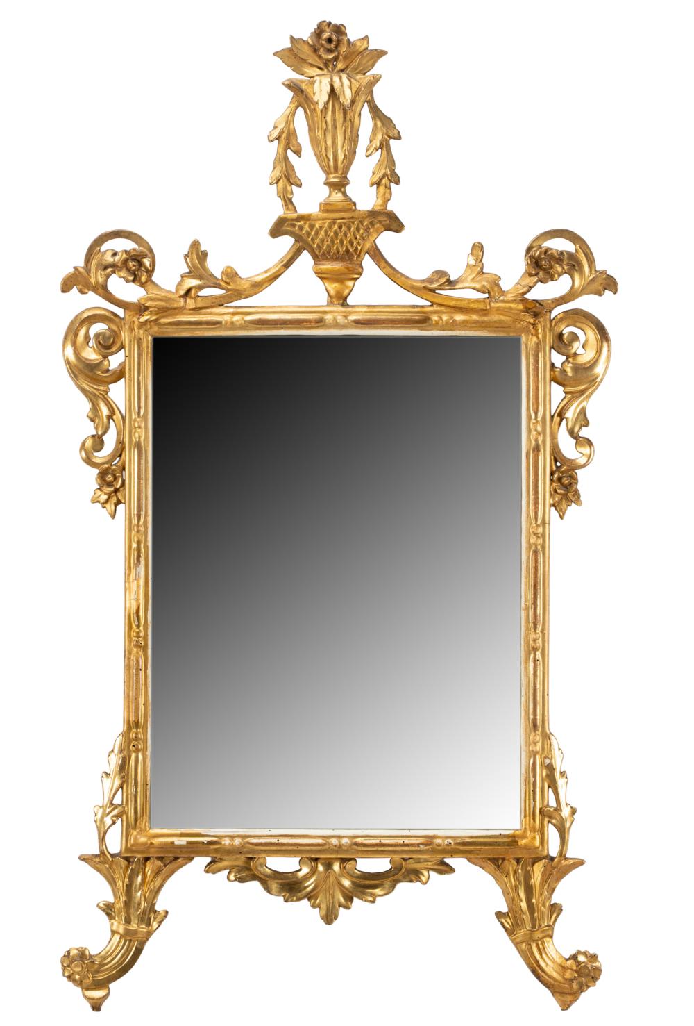 Appraisal: GILTWOOD WALL MIRROR th century with flat mirror plate Provenance