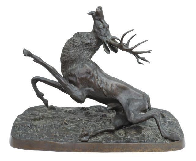 Appraisal: Patinated bronze sculpture depicting wounded stag on naturalistic base approx