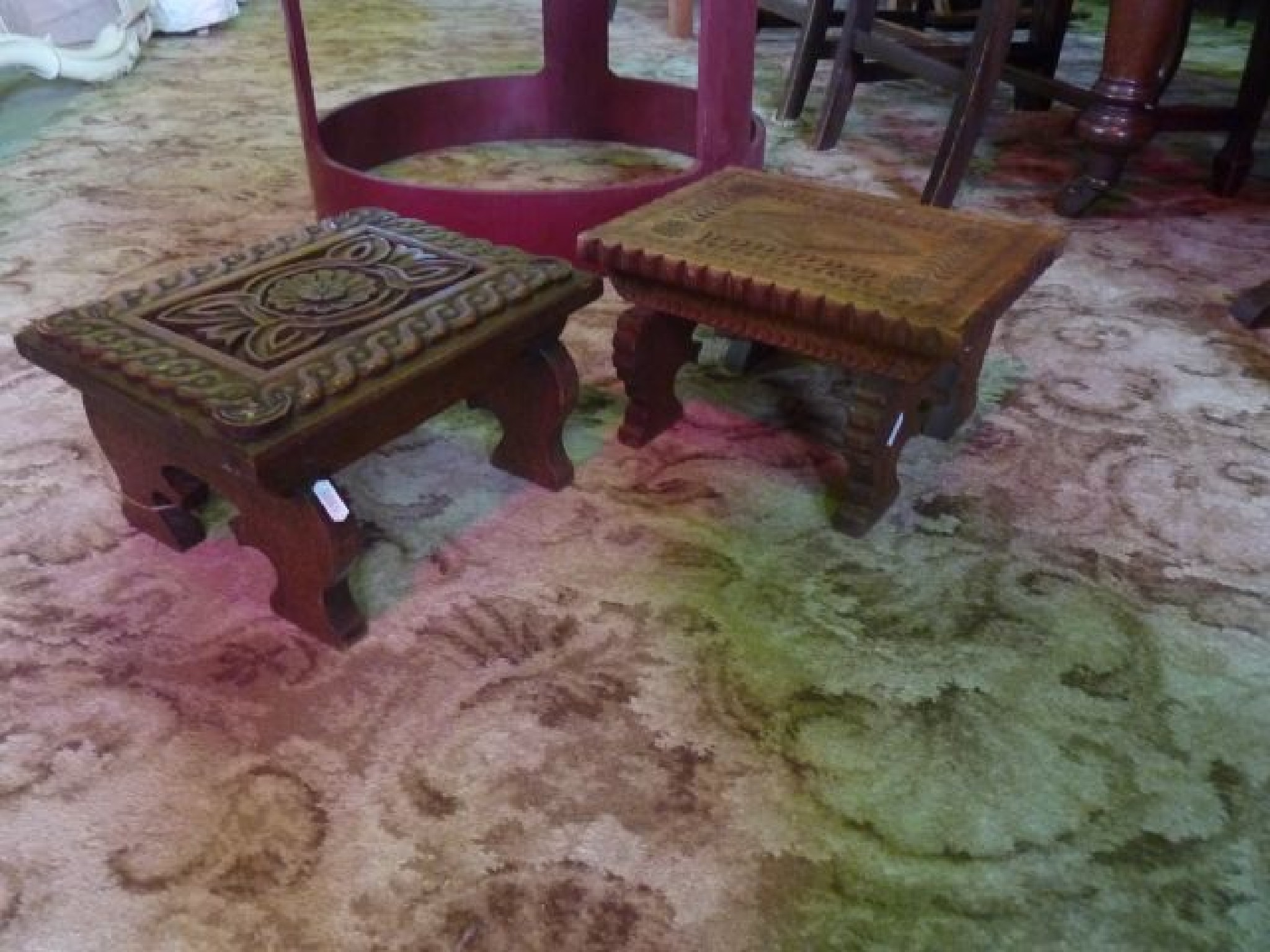 Appraisal: Two similar th century oak footstools with geometric carved detail