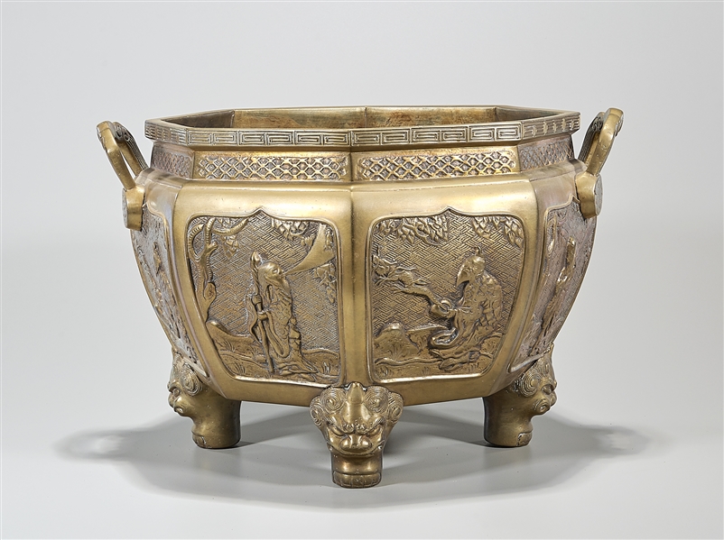 Appraisal: Chinese bronze octagonal jardiniere with relief designs of Immortals x