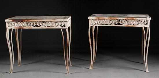 Appraisal: Pair of painted wrought metal glass top patio tables in