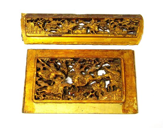 Appraisal: Two Asian carved and lacquered panels ornately pierced oblong panel