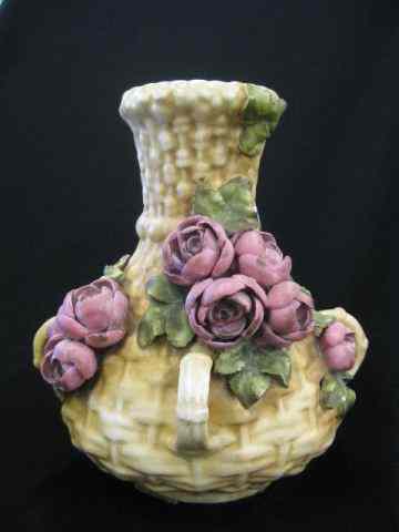 Appraisal: Amphora Austria Pottery Vase applied roses on basket weave design