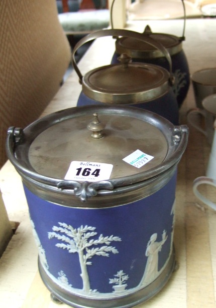 Appraisal: Three Wedgwood jasperware biscuit barrels with silver plated swing over