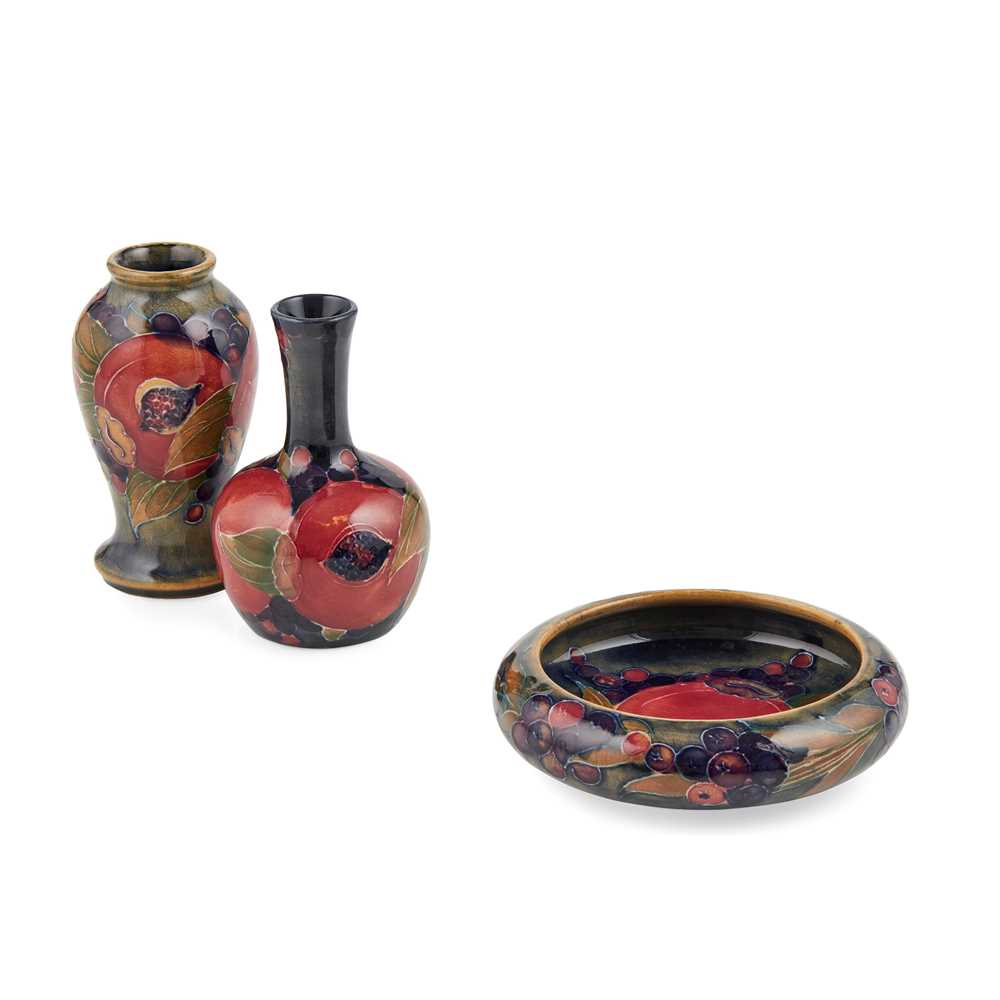 Appraisal: WILLIAM MOORCROFT - FOR MOORCROFT POTTERY TWO MINIATURE POMEGRANATE PATTERN