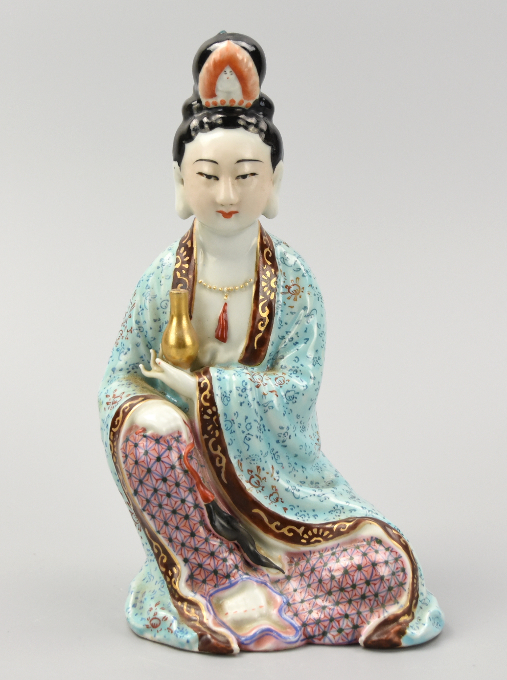 Appraisal: CHINESE SEATED GUANYIN W GILDED VASE ROC PERIOD A Republic