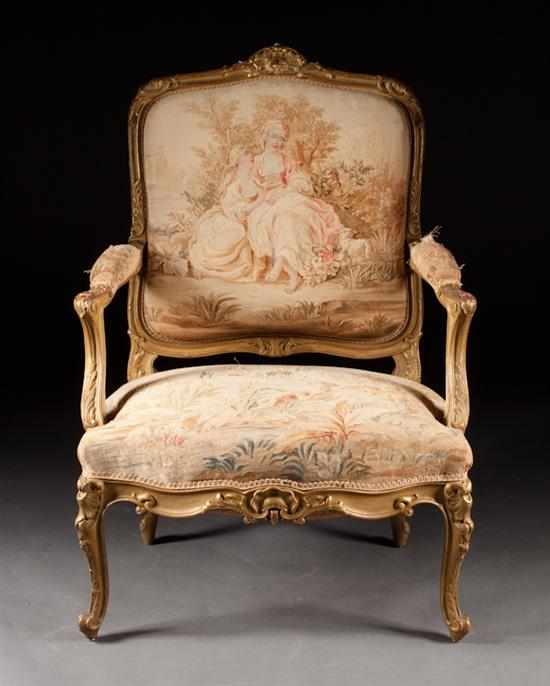 Appraisal: Louis XV style carved giltwood tapestry upholstered fauteuil th century