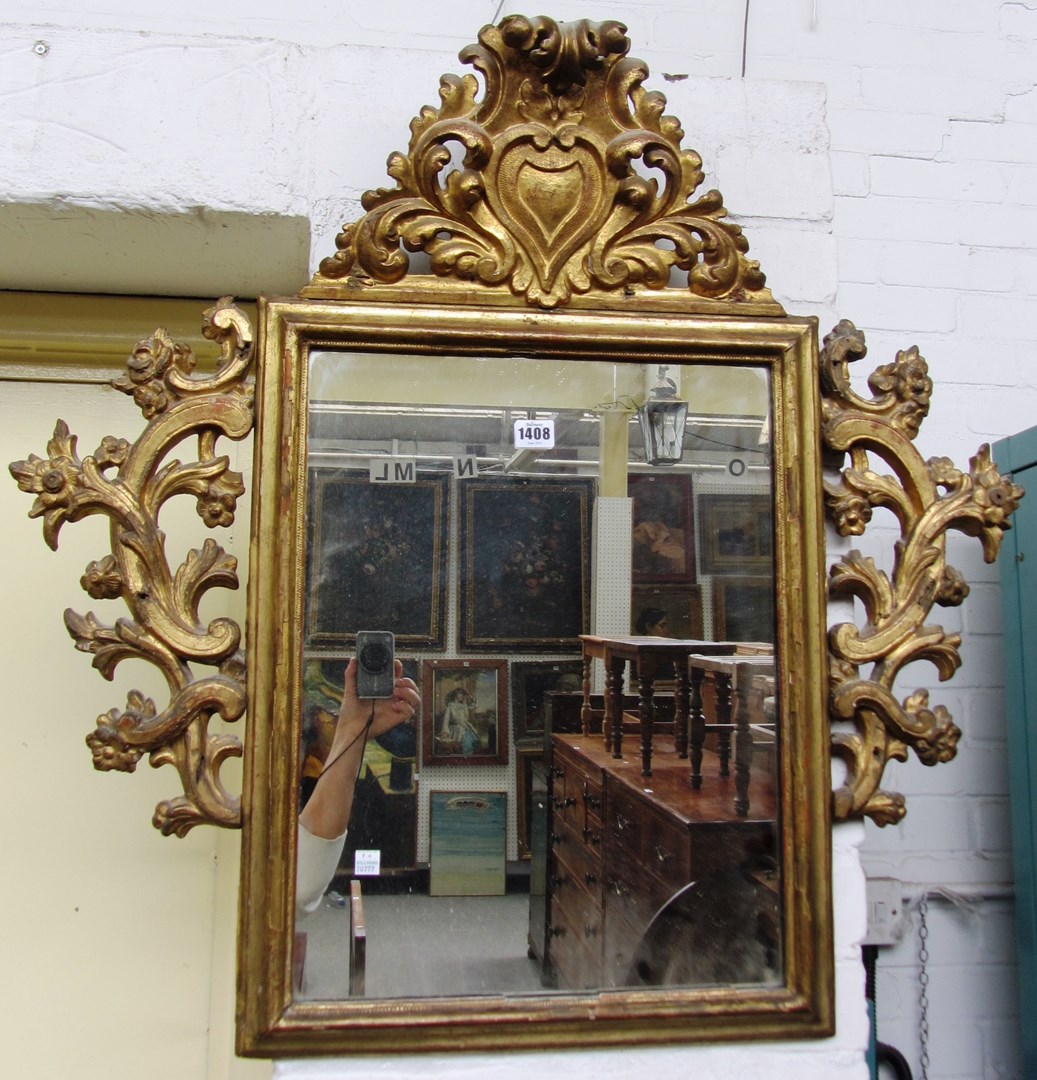 Appraisal: A th century Italian gilt framed wall mirror with cartouche