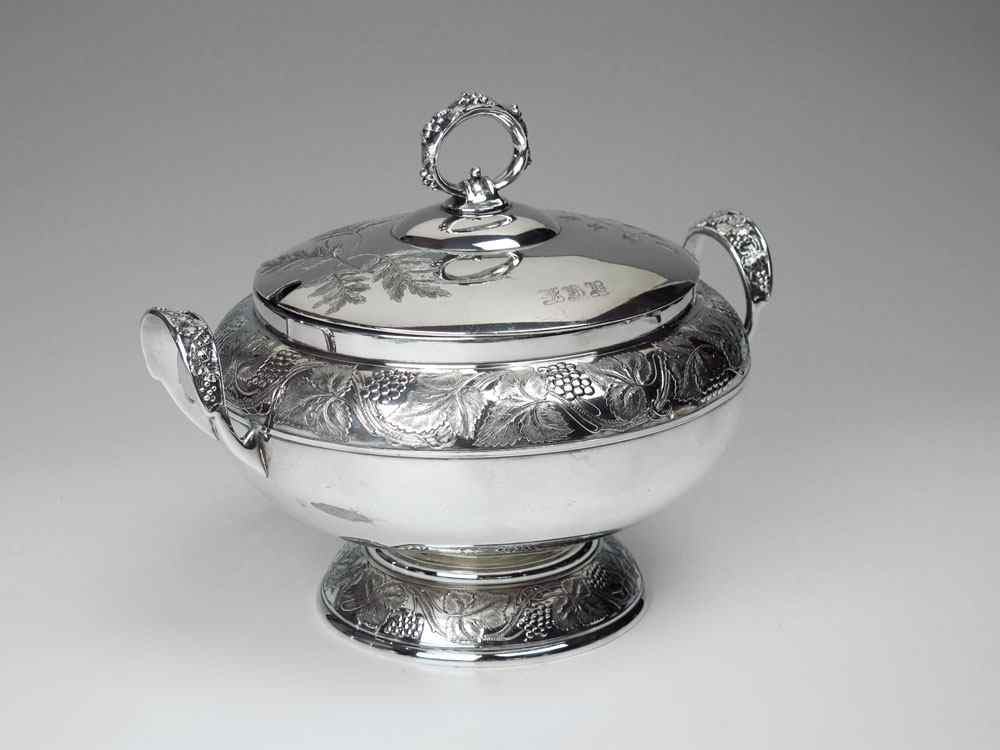 Appraisal: PAIRPOINT SILVERPLATE SOUP TUREEN Embossed grape vine motif engraved lid