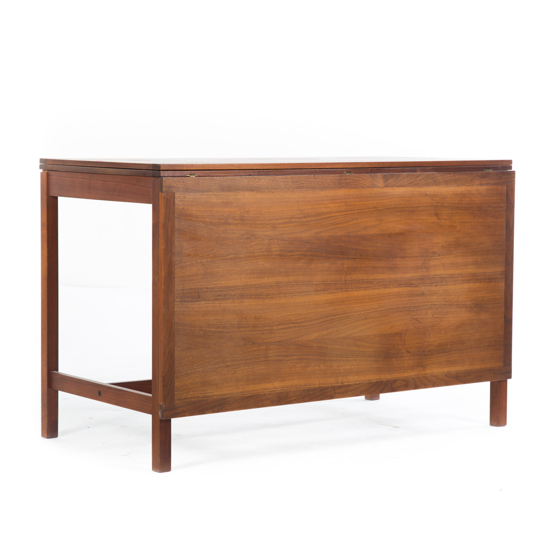 Appraisal: Danish Modern style teakwood drop leaf table in H in