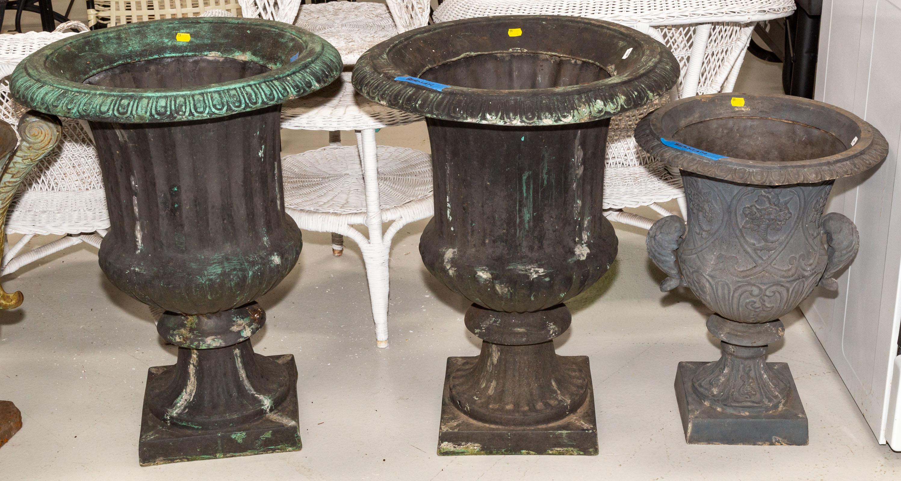 Appraisal: THREE CLASSICAL STYLE GARDEN URNS th century fiberglass with patinated