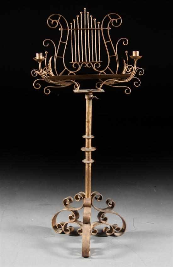 Appraisal: Rococo Revival gilt-metal lyre-back music stand triform scroll base with