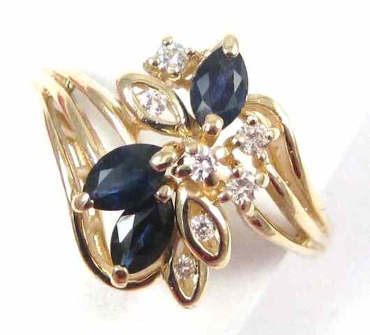 Appraisal: SAPPHIRE DIAMOND AND YELLOW GOLD RING The k gold ring