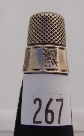 Appraisal: USA thimble with panel designed band