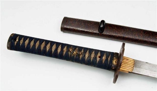 Appraisal: A JAPANESE SHORT KATANA with an iron tsuba shagreen handle