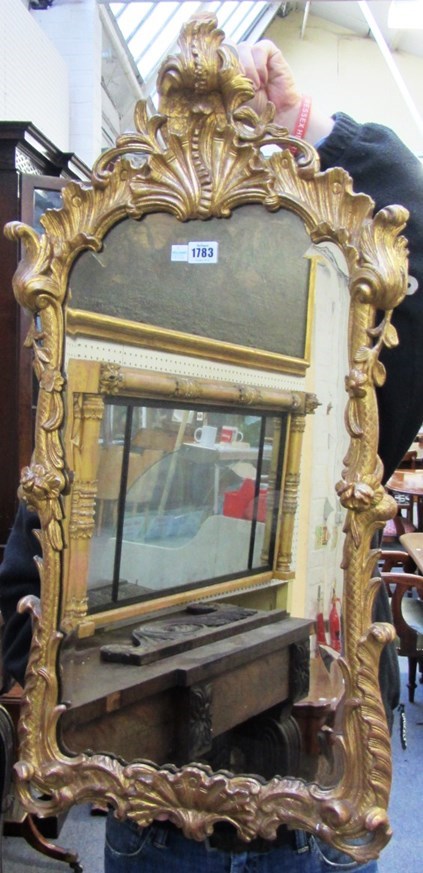 Appraisal: An th century French gilt framed pier glass with stylised