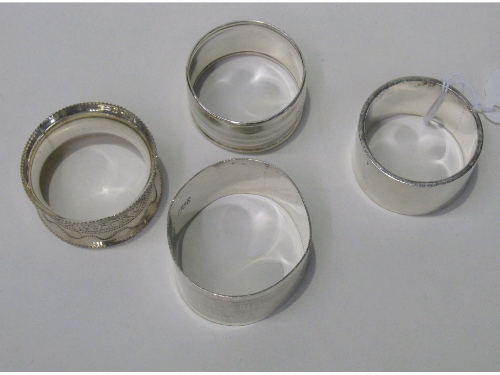 Appraisal: Lot comprising four silver napkin rings assorted marks