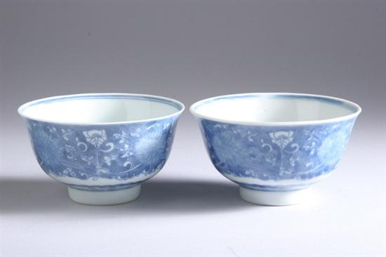 Appraisal: NEAR PAIR CHINESE BLUE AND WHITE PORCELAIN BOWLS Guangxu four-character