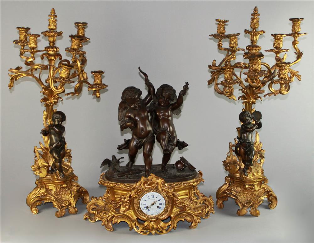 Appraisal: FRENCH GILT AND PATINATED BRONZE CLOCK GARNITURE MARKED J B