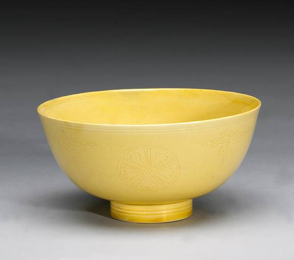 Appraisal: A yellow glazed porcelain bowl Kangxi Mark and Period Of