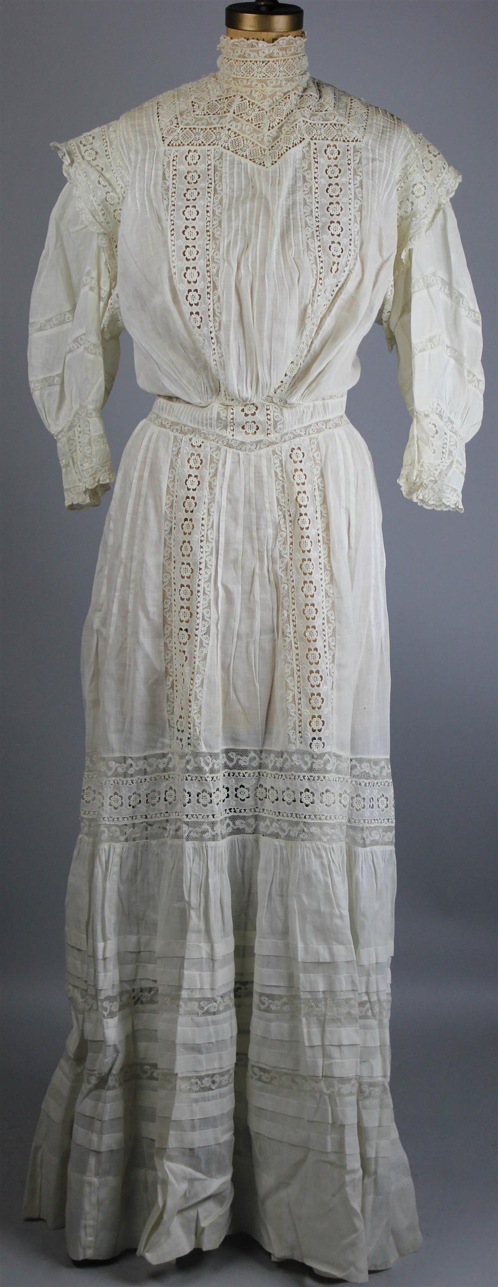 Appraisal: EDWARDIAN WEDDING DRESS AND A CIRCA LINEN AND LACE TEA