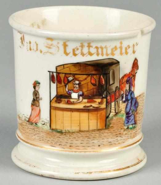 Appraisal: Traveling Butcher Shop Shaving Mug Description Gilt name Jno Stettmeier