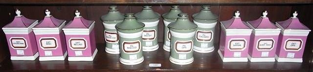 Appraisal: TWO SIMILAR SETS OF SIX JARS one cylindrical of green