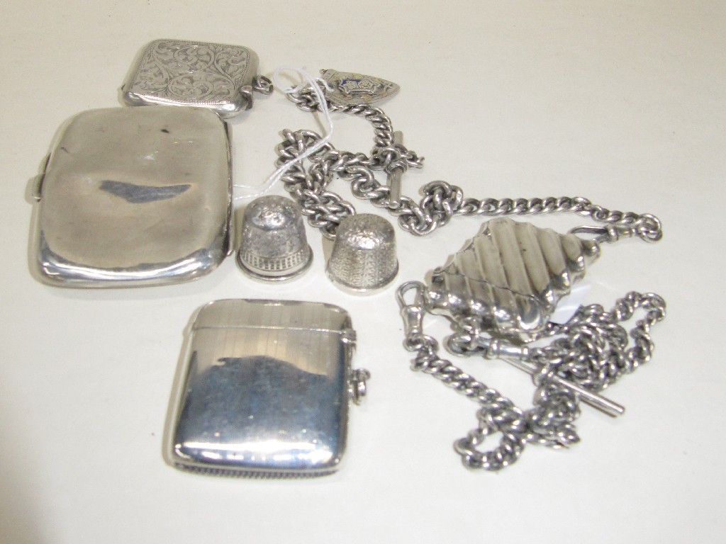 Appraisal: Lot comprising silver cigarette case three silver vestas two silver