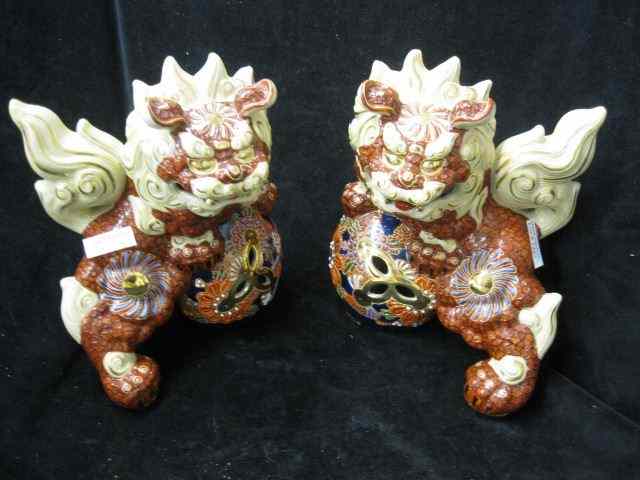 Appraisal: Pair of Oriental Pottery Foo Dog Figurines moriage satsuma style