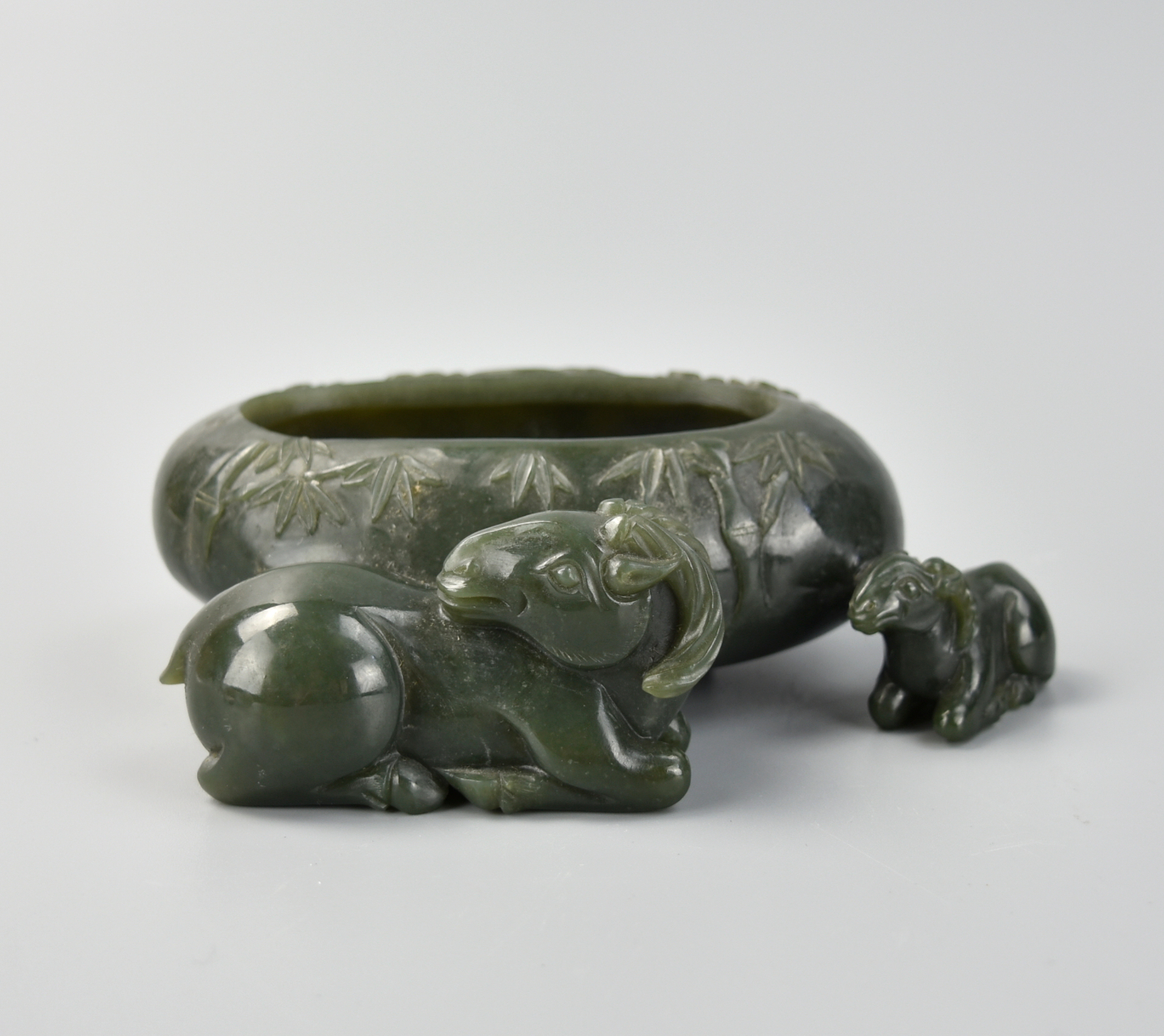 Appraisal: CHINESE CARVED GREEN JADE WASHER W GOAT QING D Chinese