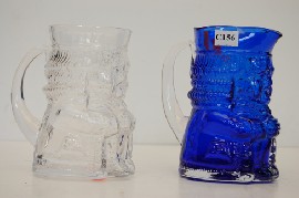 Appraisal: TWO GLASS TOBY JUGS