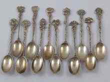 Appraisal: A set of twelve silver demitasse coffee spoons each with