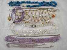 Appraisal: A quantity of costume jewellery and two amethyst necklaces