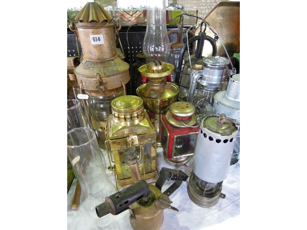 Appraisal: An extensive collection of various lamps and lanterns including hurricane