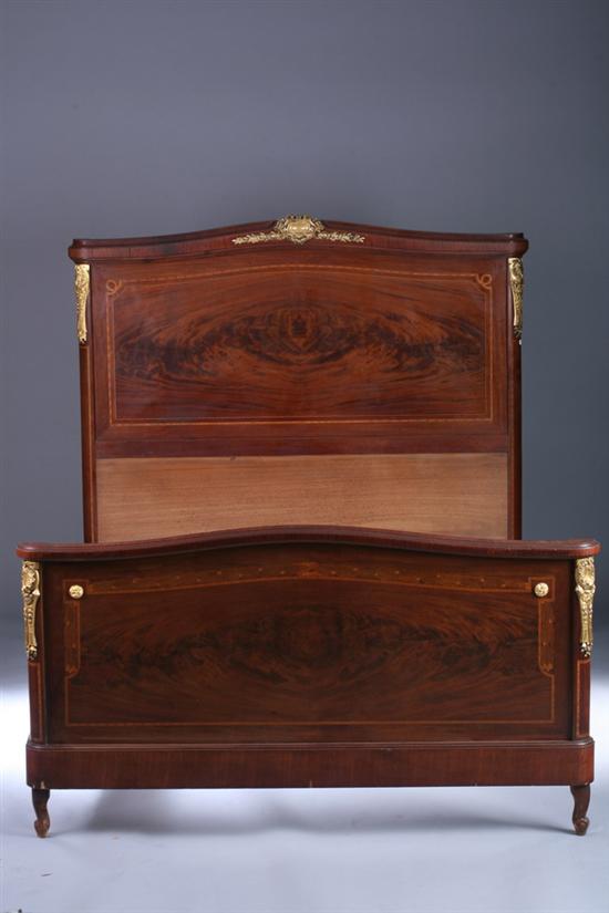 Appraisal: LOUIS XVI STYLE INLAID MIXED-WOOD BED th century with cabochon