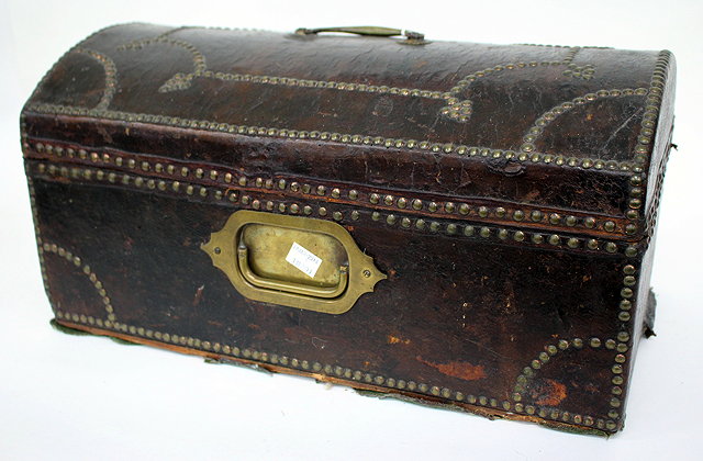 Appraisal: A GEORGIAN STUDDED LEATHER BOUND DOME TOPPED SMALL TRUNK with