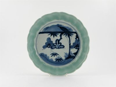 Appraisal: A Japanese Arita moulded dish painted in blue with bamboo