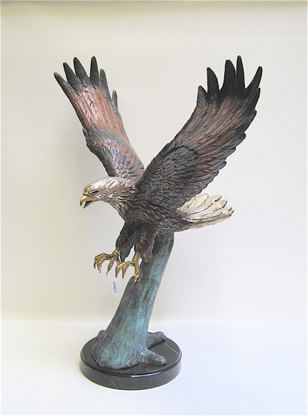 Appraisal: PATINATED BRONZE WILDLIFE SCULPTURE an American bald eagle in flight