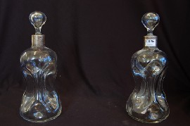 Appraisal: A PAIR OF S SILVER MOUNTED DECANTERS