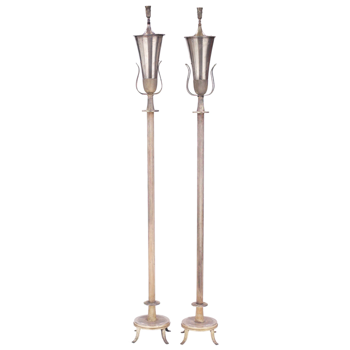 Appraisal: Tommi Parzinger floor lamps pair silver-plated metal with removable top