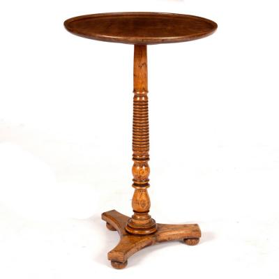 Appraisal: A th Century circular table on a ring turned elm